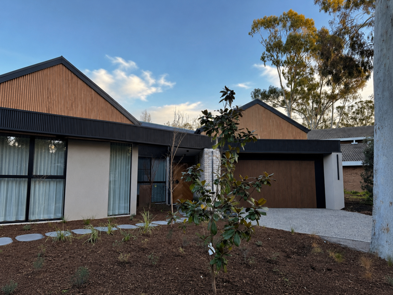 Canberra home with timber-look and Night Sky metal cladding